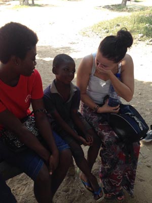 Aimee Parker and Loal Volunteer with Kid