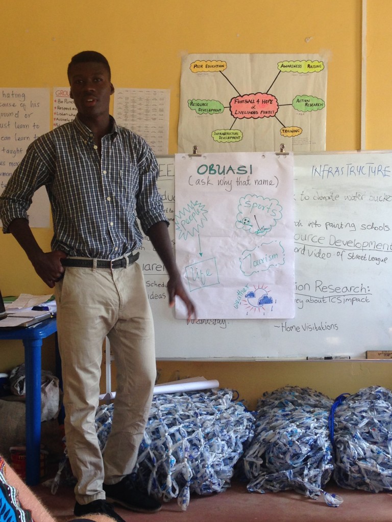 Bayala Mike educating the team about his culture "OBUASI"